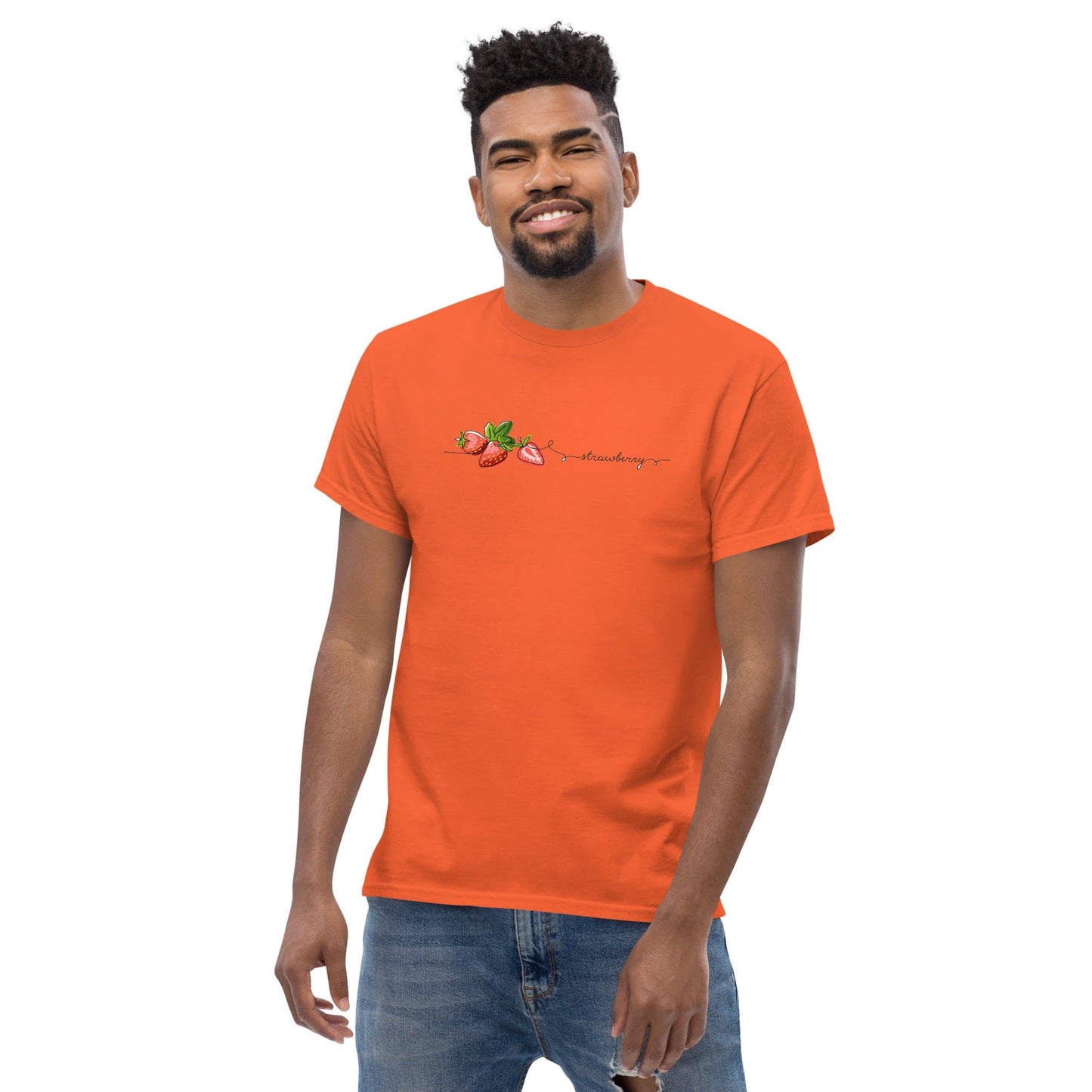 Orange t-shirt with strawberry design.